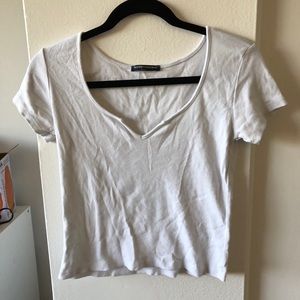 White t shirt with open neckline